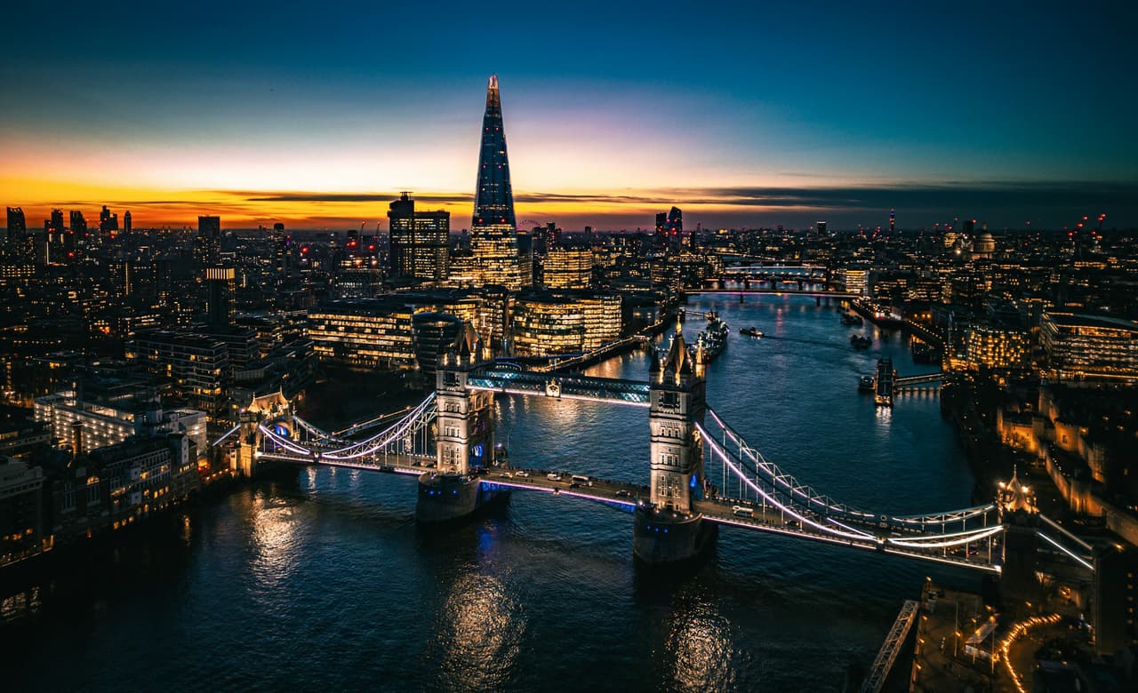 Aerial view of the City of London skyline in low light